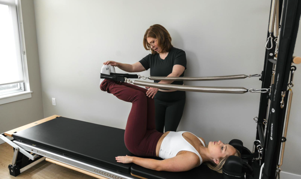 Photo of me teaching Pilates - Wellness by Norah