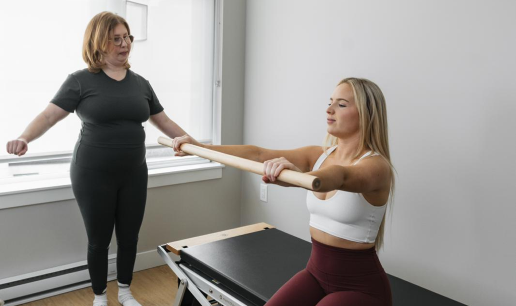 Photo of me teaching Pilates - Wellness by Norah